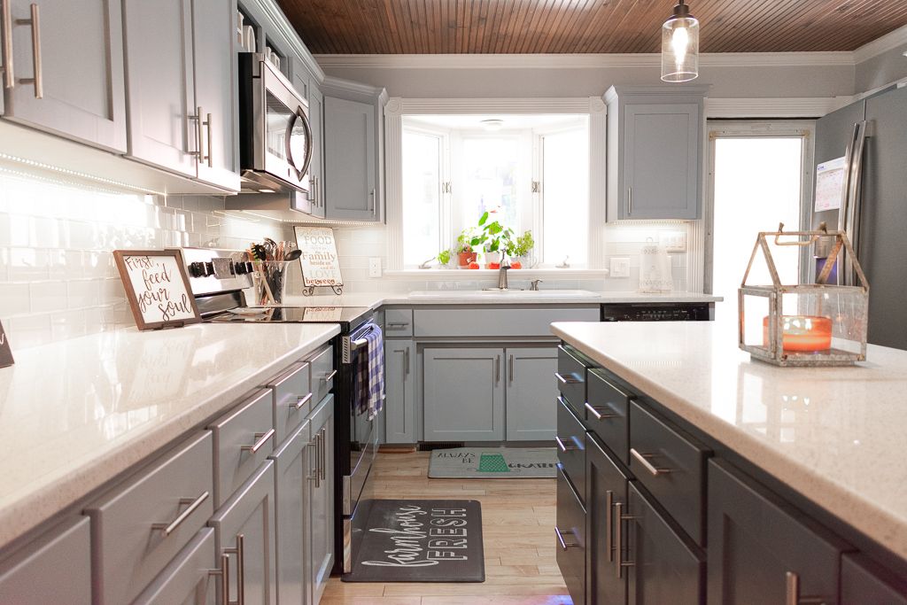 gray-shaker-cabinets-topped-with-white-lace-quartz-countertops.jpg